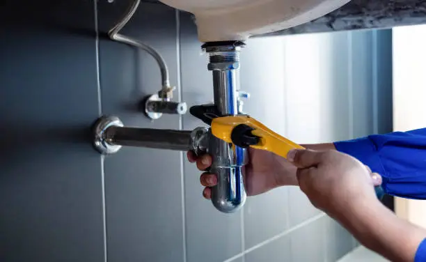 Plumber Fixing Sink issue